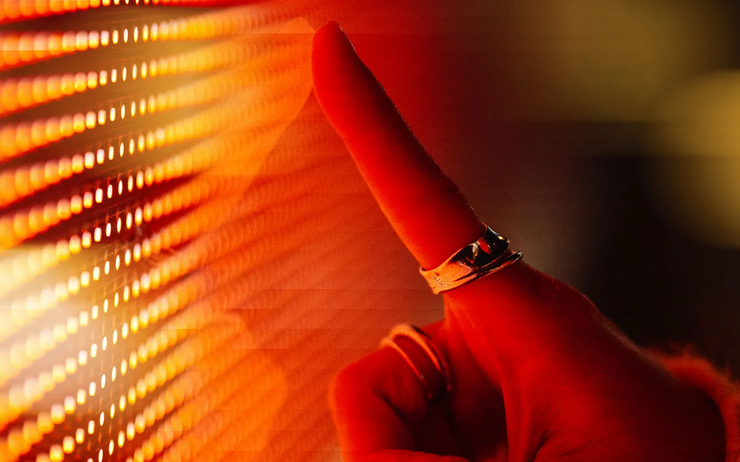 A finger touching a screen