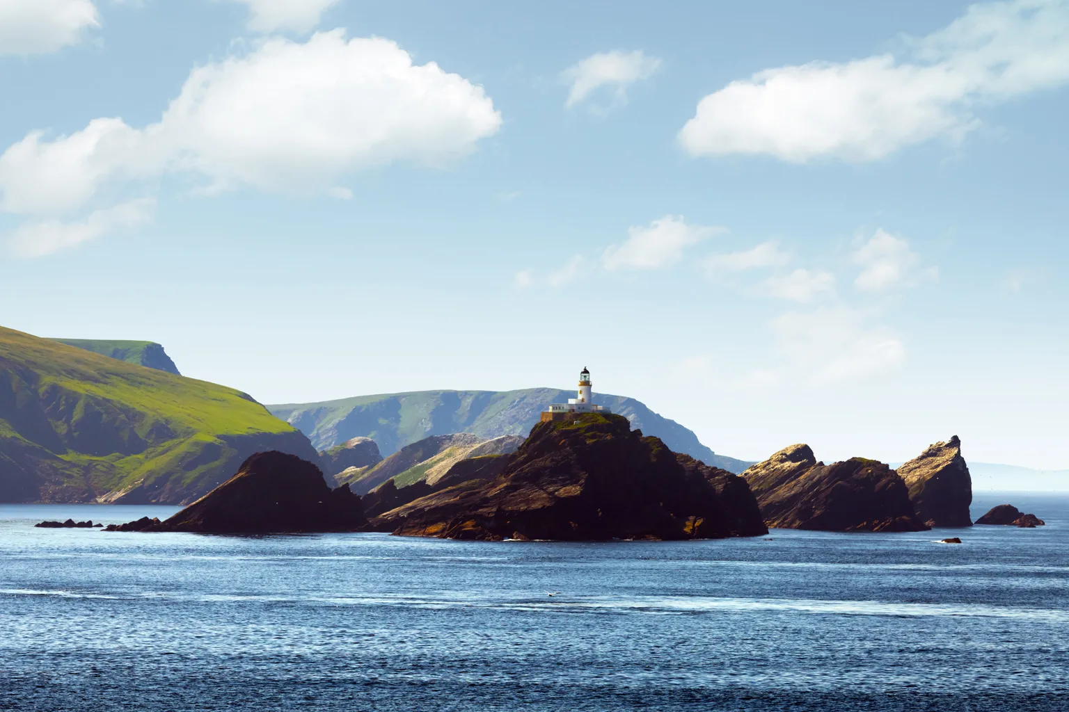 Seascape with lighthouse on Shetland Islands
