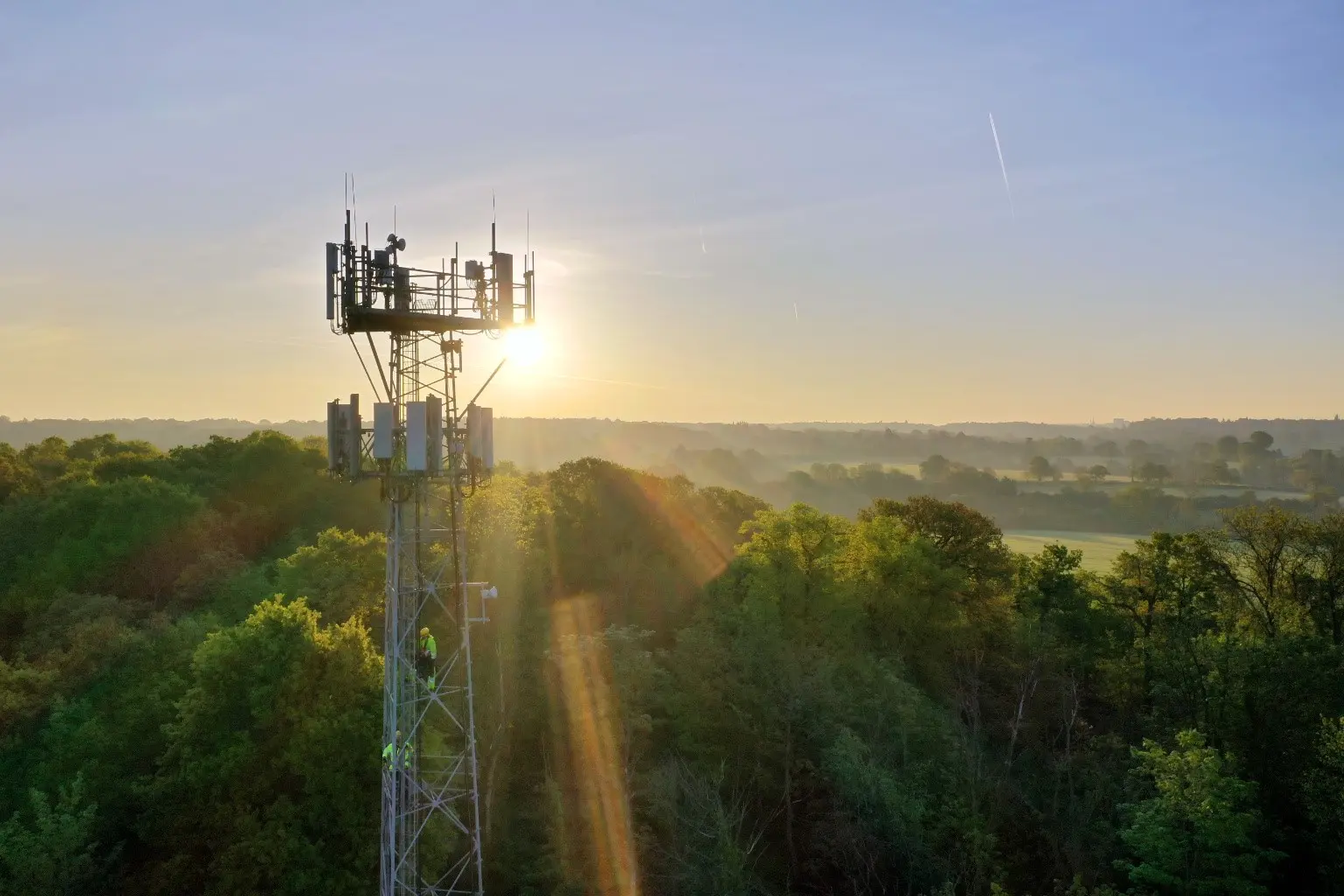 Network mast at sunrise