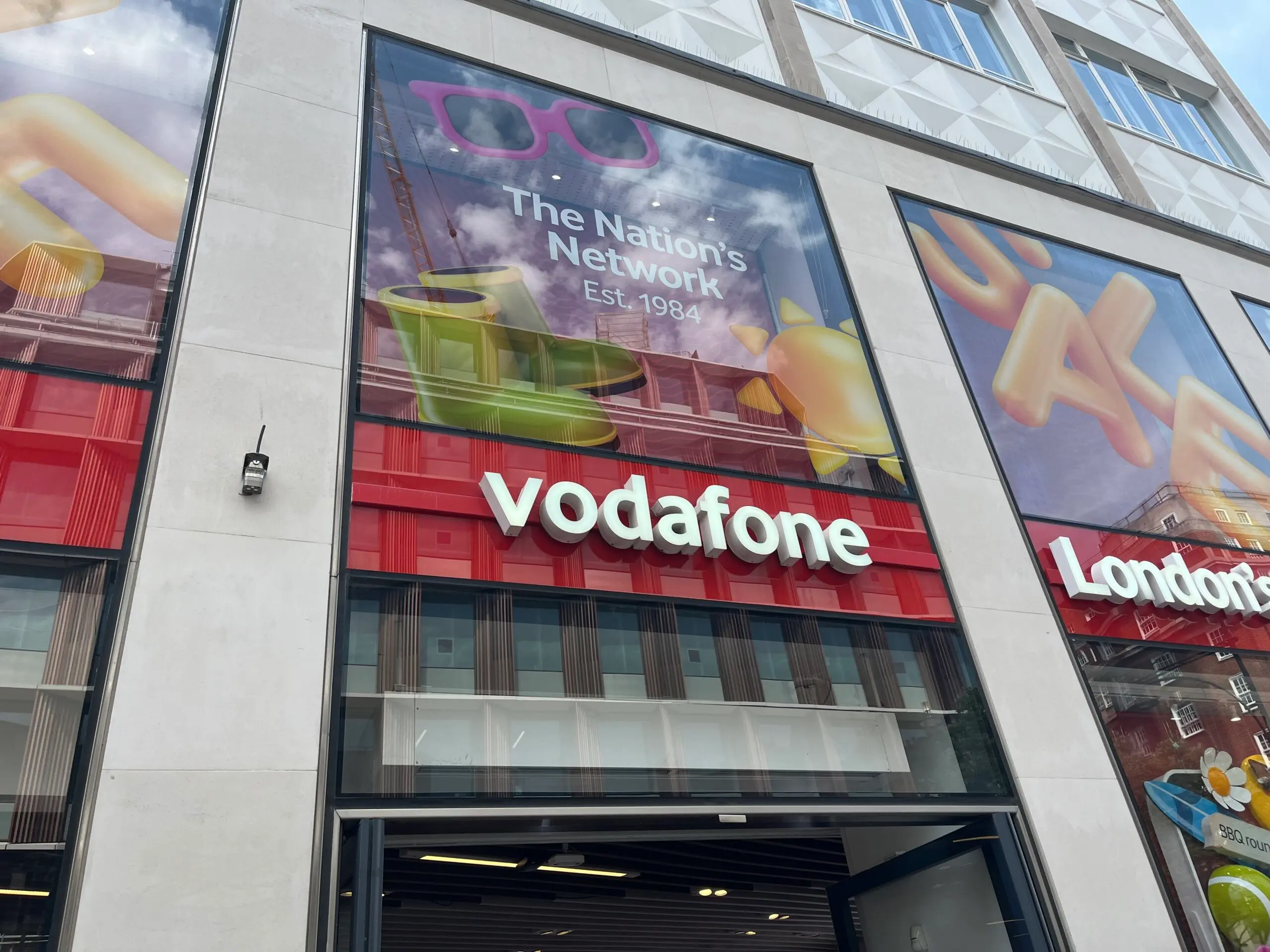 An air quality sensor attached to Vodafone store on Oxford Street, London.