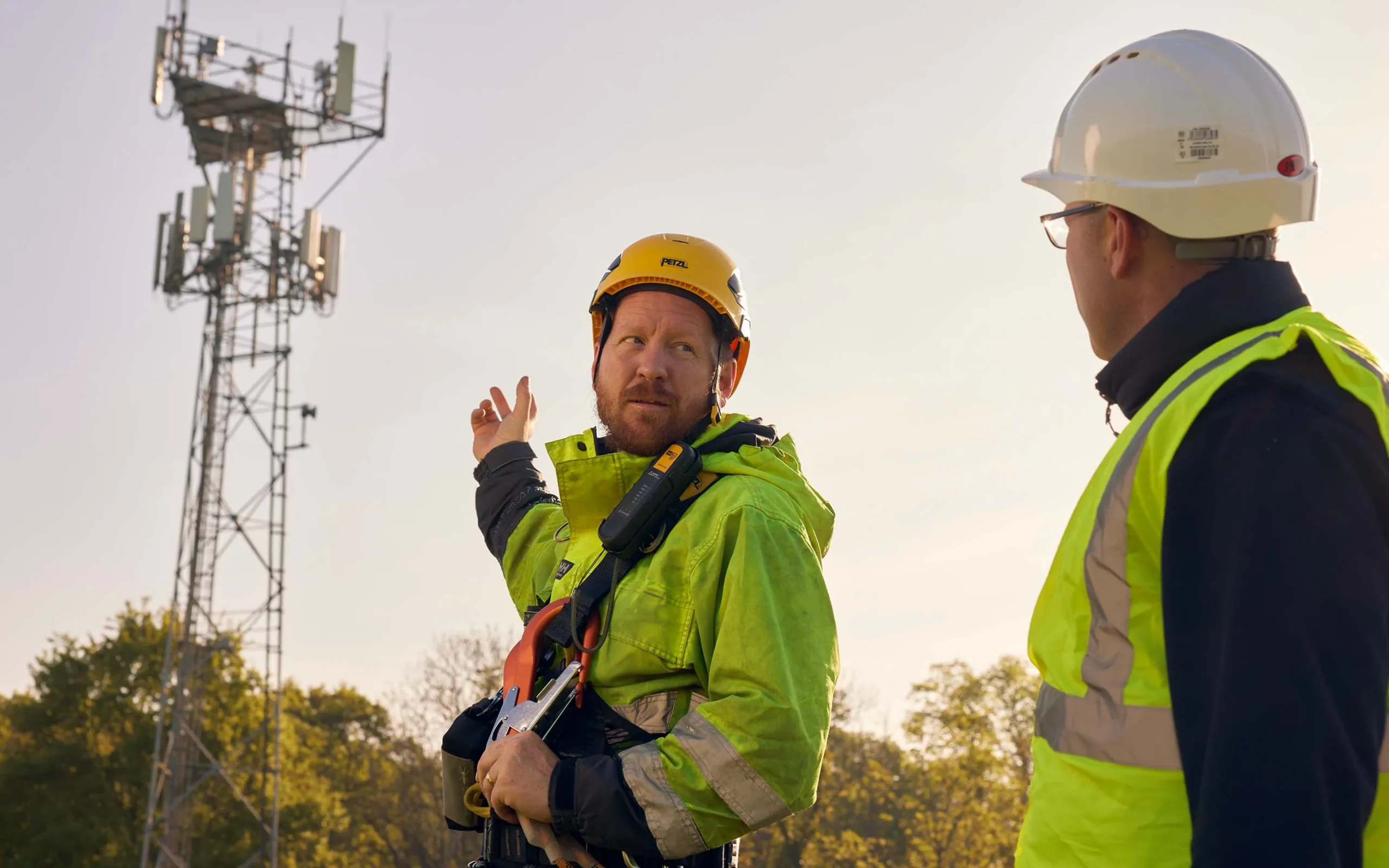 Men looking at a pylon