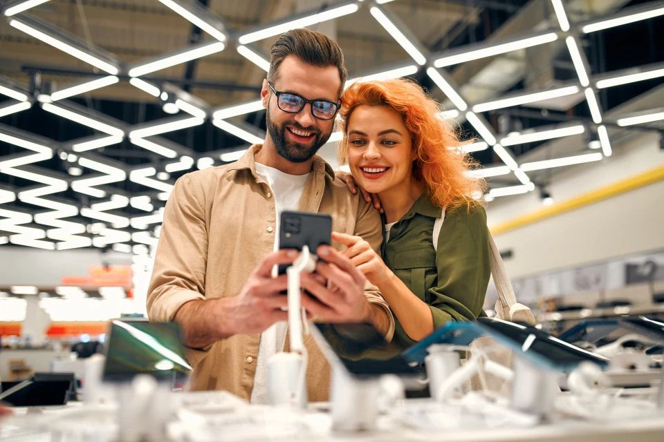 A couple looking at a phone