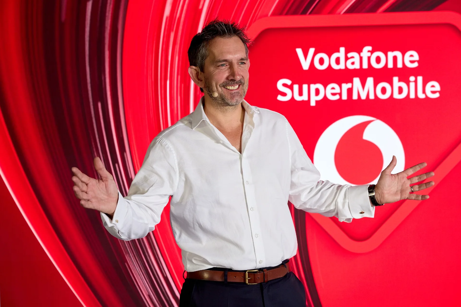 Max Taylor on stage at the Vodafone SuperMobile launch event.